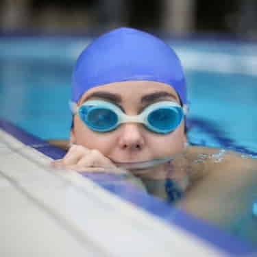 a swimmer with the best swim goggles