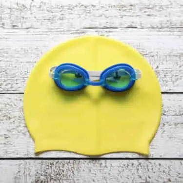 swim goggles and swim cap